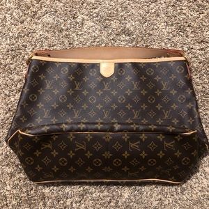 SOLD Authentic and in excellent condition!!